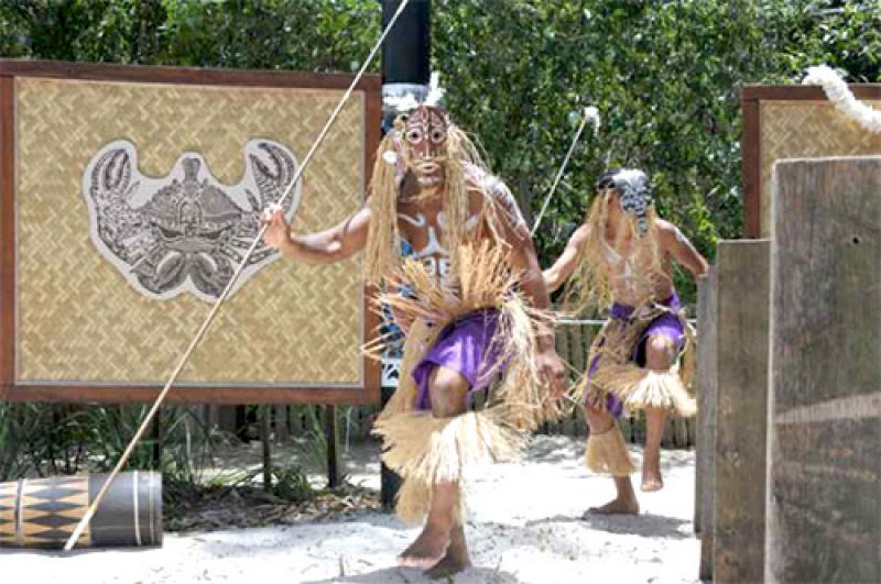 Torres Strait Islander men dancing a tradition dance, Torres Strait, Queensland
